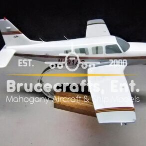 Model of Piper PA 32E Saratoga (N991AS) with detailed craftsmanship.